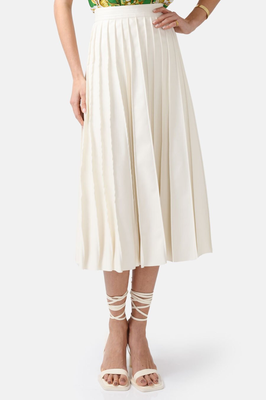 White Pleated Vegan Leather Midi Skirt Kargede Designer Skirt Front - Solace – Pleated White Vegan Leather Midi Skirt